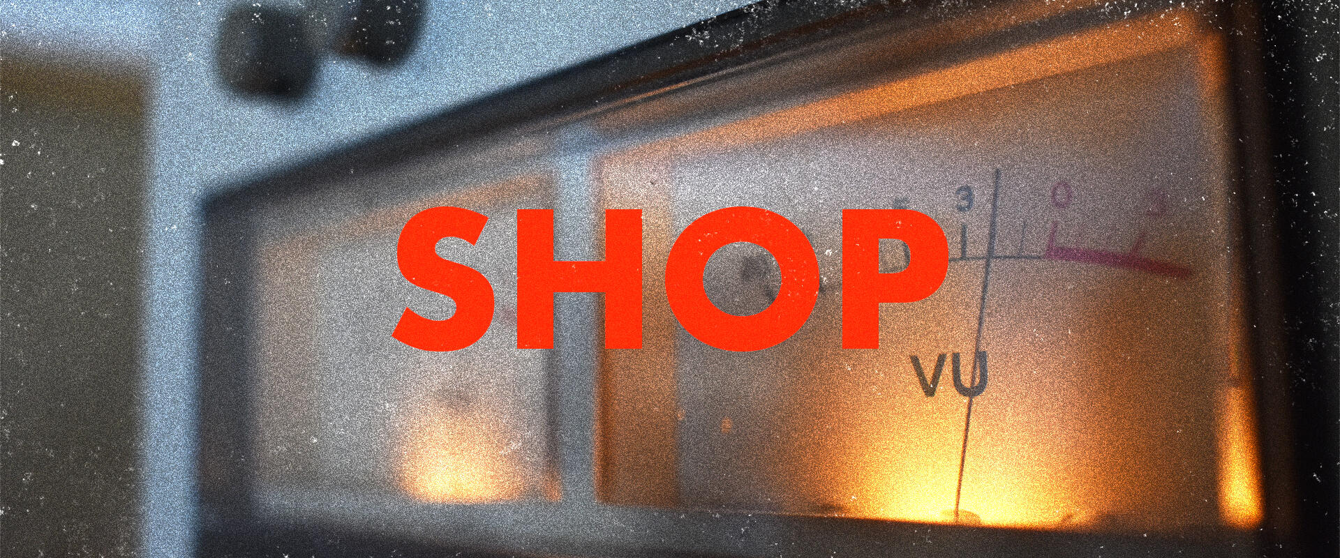 High-contrast black and white close-up of a bass drum, capturing the grainy texture and vintage vibe of analog drum kits.